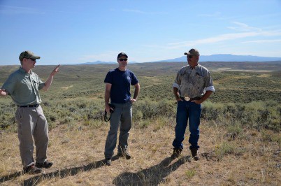 From left: Chris Yarbrough (SGI in partnership with RMEF), Brian Holmes, Colorado Division of Wildlife biologist, and Ray Owens, Bord Gulch Ranch manager. Photo: Deborah Richie, SGI