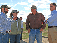 NRCS Chief Jason Weller, right, met with Scott Wessel on his ranch near Lavina, Mont., to see conservation practices