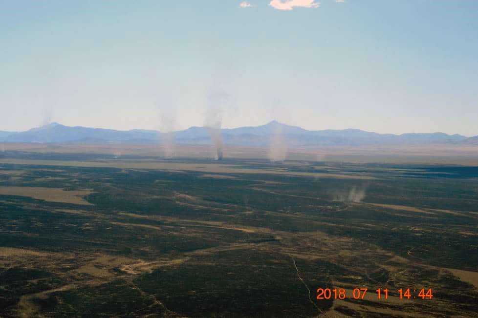 Dust devils, some of them rising hundreds of feet in elevation, observed from the air after the Martin Fire. Photo: Bruce Thompson, BLM